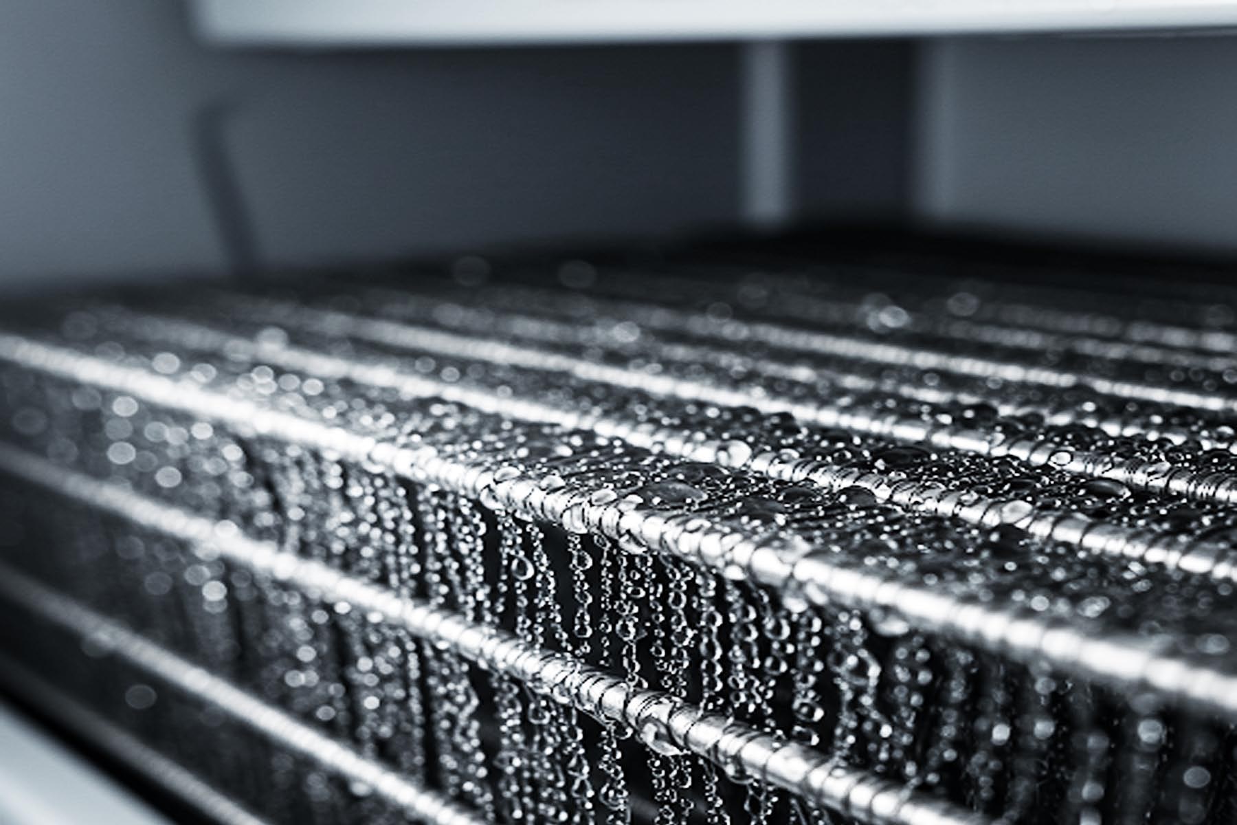 Humid climate refrigerator repair: condensation on dirty condenser coils, Lockhart, TX